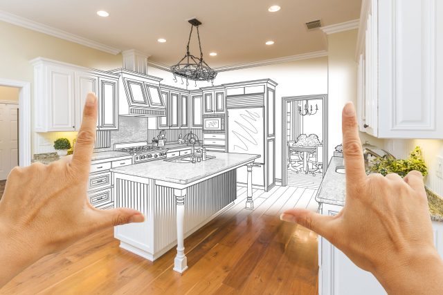 two hands point at a drawing of a kitchen.